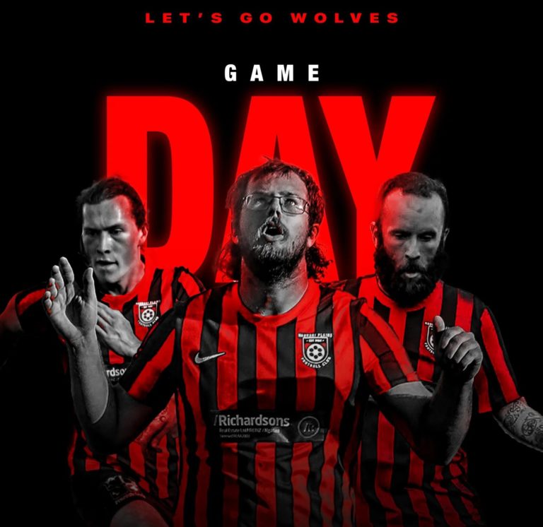 Hauraki Plains Football Club players wearing red and black Wolves kit celebrating on game day.